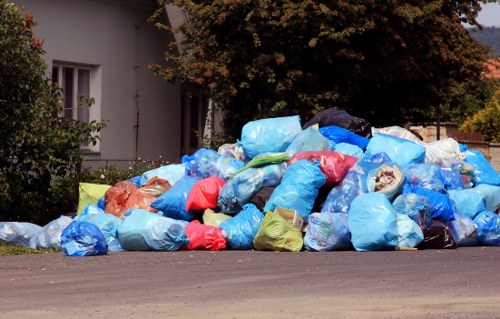 Waste collection trucks in Wanstead